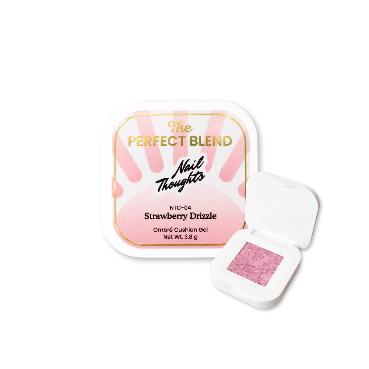A square cosmetic compact labeled 'The Perfect Blend Nail Thoughts Strawberry Drizzle' with the lid open, showing a pink shimmering gel cushion. The compact is photographed on a clean white background.