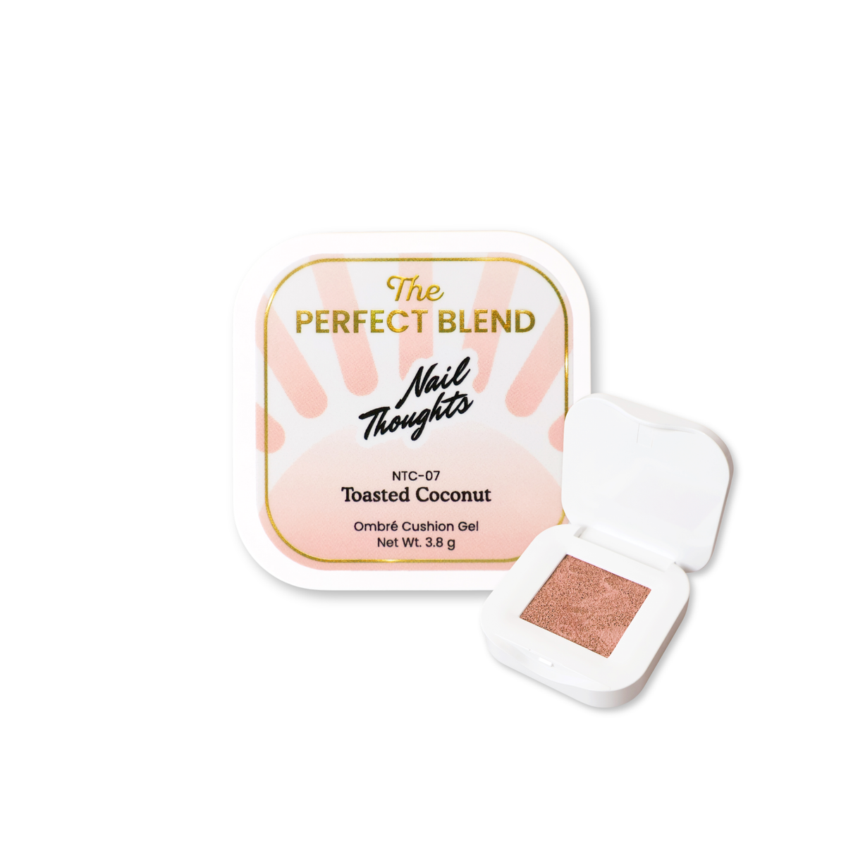 A square cosmetic compact labeled 'The Perfect Blend Nail Thoughts Toasted Coconut' with the lid open, showing a warm peachy rose shimmer gel inside a white compact on a white background.