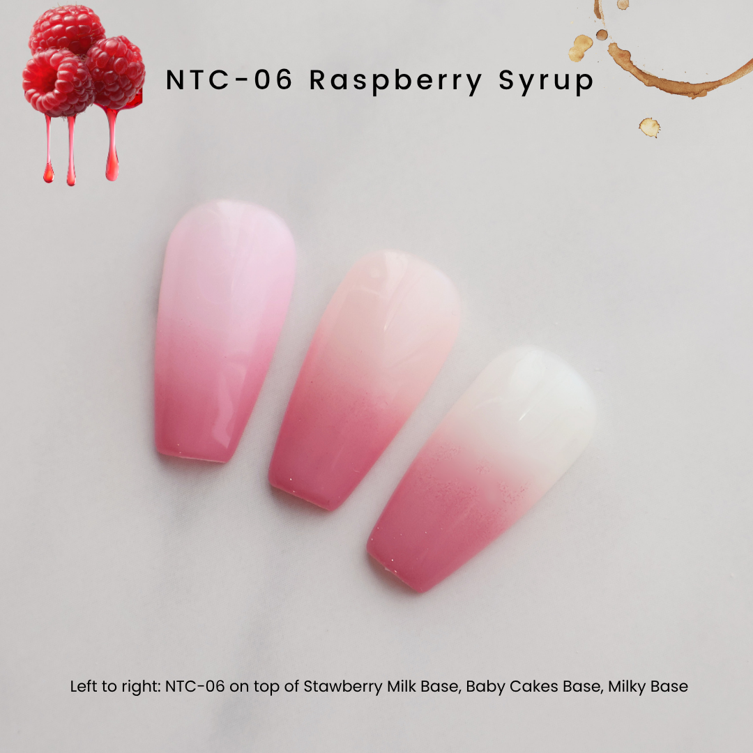 Three false nail tips with a pink-to-white ombre gradient, labeled NTC-06 Raspberry Syrup, on a light gray background with raspberry and coffee splash graphics and text describing the base colors.